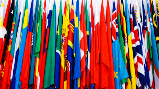 A group of flags standing up next to each other.