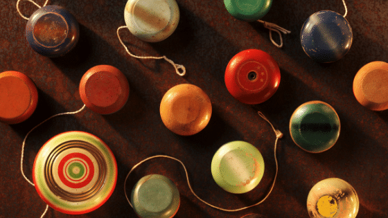 A variety of yo-yo's laying horizontally.